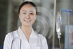 Portrait of smiling female doctor outside of the hospital