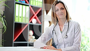 Portrait of smiling female doctor with stethoscope in clinic