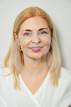 Portrait smiling female doctor wearing white coat