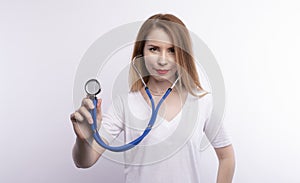 Portrait Of Smiling Female Doctor Wearing White Coat With Stethoscope