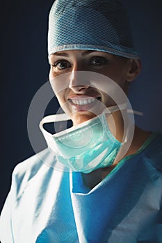 Portrait of smiling female surgeon in operation room