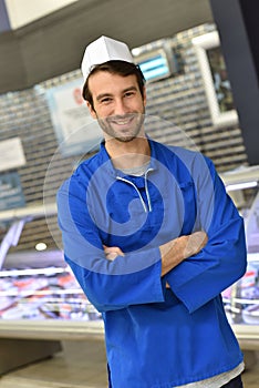 Portrait of smiling fishmonger