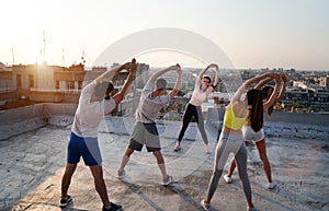 Portrait of smiling fit happy people doing power fitness exercise