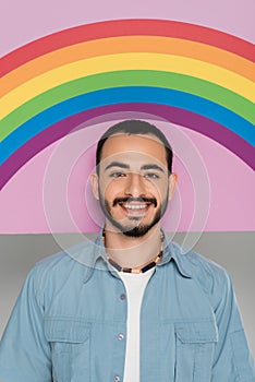 Portrait of smiling gay man looking