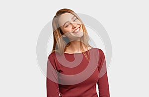 Portrait of smiling girl grins at camera, grinning