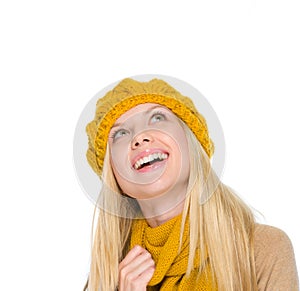 Portrait of smiling girl looking up on copy space