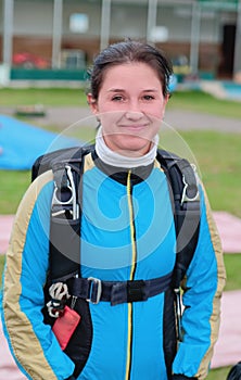 Portrait of the smiling girl-parachutist photo