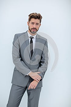 Portrait of a smiling handsome business man over white backgrou