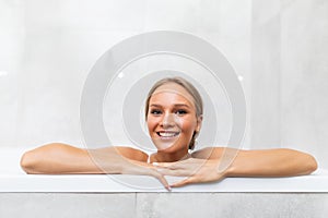 Portrait of smiling of happy beautiful woman clean fresh healthy white skin enjoy relaxing taking shower and bath with in bathtub