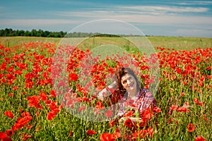 Portrait smiling happy old Elderly woman having fun, walking in a field with poppy flowers. Healthcare lifestyle senior lady relax