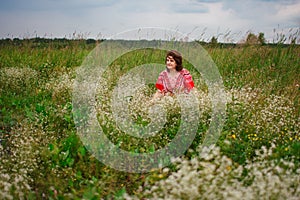 Portrait smiling happy old Elderly woman having fun, walking in a field with poppy flowers. Healthcare lifestyle senior lady relax