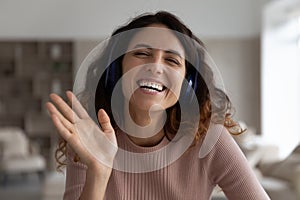 Portrait of smiling Hispanic woman talk on webcam call