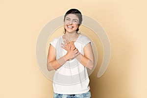 Portrait of smiling Indian woman feel grateful