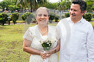 Portrait of smiling Latin husbands outdoors