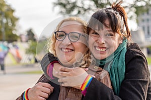 Portrait of a smiling lesbian couple hugging each other