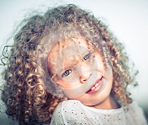 Portrait of a smiling little girl