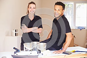 Portrait of smiling male and female decorators