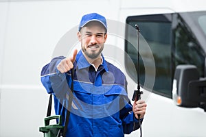 Portrait Of A Smiling Male Pest Control Worker photo