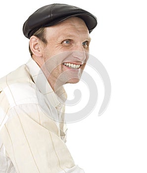Portrait of the smiling man in a cap