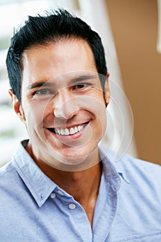 Portrait Of Smiling Man At Home