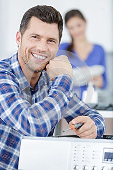 portrait smiling man in office