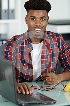 portrait smiling man in office