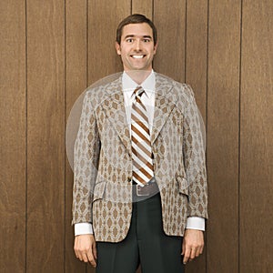 Portrait of smiling man in retro suit