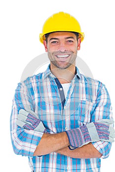 Portrait of smiling manual worker with arms crossed