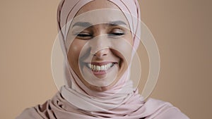 Portrait smiling muslim female headshot close-up face young girl in hijab looking at camera arab attractive woman in