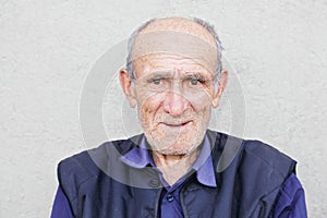 Portrait of smiling old hoary man photo