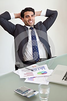 Portrait of a smiling sales person relaxing