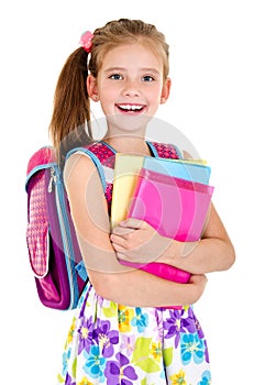 Portrait of smiling school girl child with school bag and books