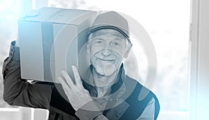 Portrait of smiling senior deliverer;black and white