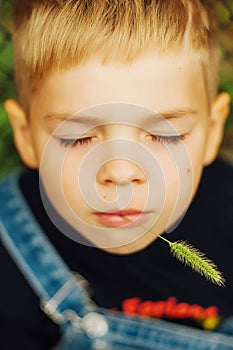 Portrait of smiling seven year old boy. Seven year old boy with