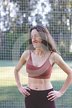 Portrait of a smiling sportive woman