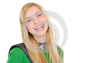 Portrait of smiling student girl with backpack