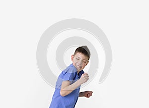 Portrait of smiling teen boy. Happy teenager wearing t-shirt.