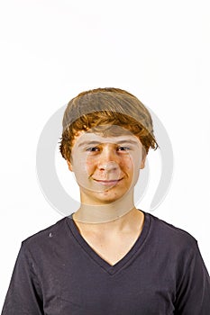 Portrait of a smiling teen boy in studio