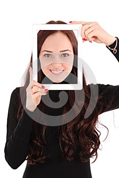 Portrait smiling teenage girl with digital tablet making selfie