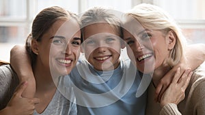 Portrait of smiling three generations of Caucasian women