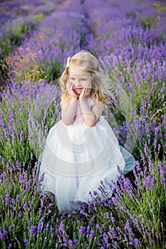 Portrait smiling toddler girl in lavender