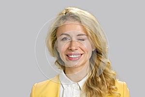 Portrait of smiling twinkling woman.