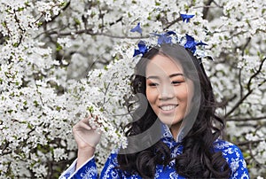 Portrait of Smiling Vietnamese girl in Ao Dai