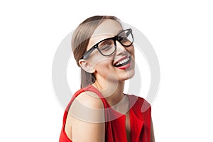 Portrait of smiling winking woman in glasses with red lips