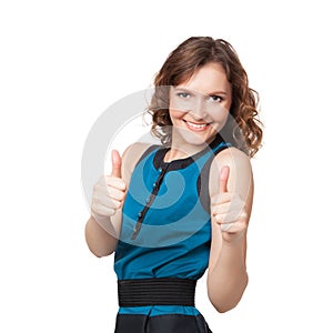 Portrait of a smiling woman while giving two thumbs up