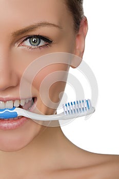 Portrait smiling woman with toothbrush in teeth