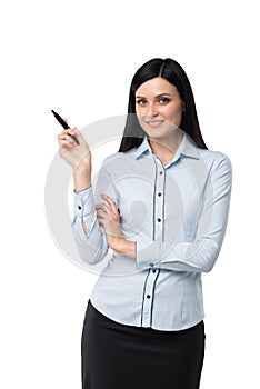 Portrait of smiling woman who points out something by the pen.