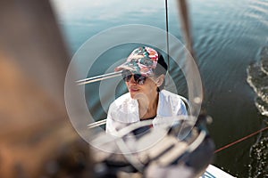 Portrait of a smiling woman on a yacht