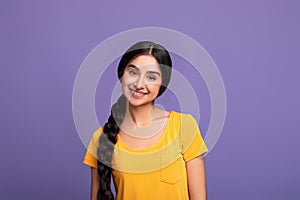Portrait of smiling young friendly indian woman
