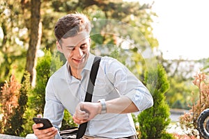 Portrait of a smiling young man dressed in shirt